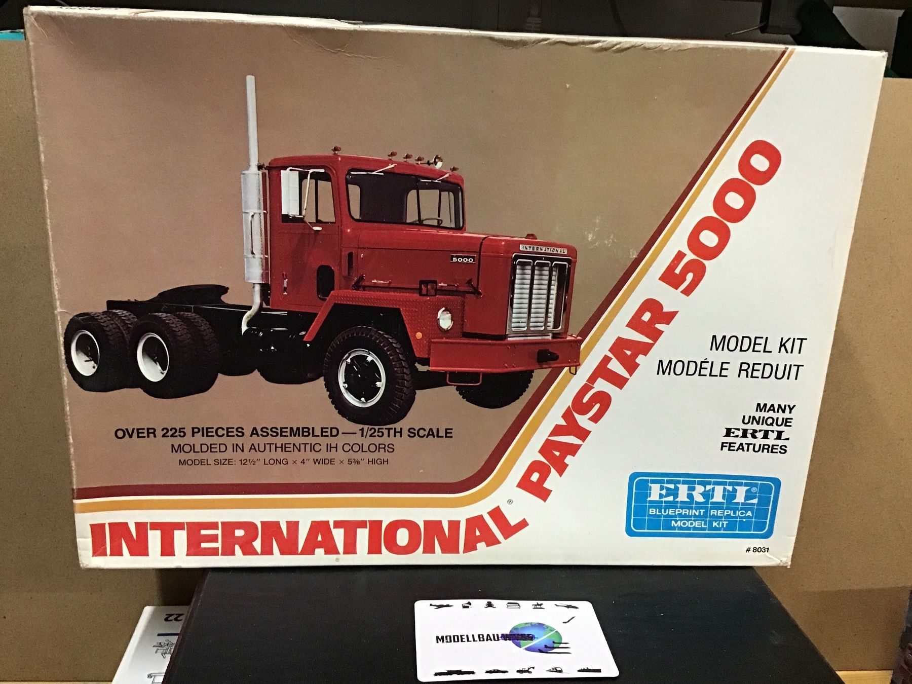 Kit di modellismo & Modellini statici: ERTL Paystar 5000 Modelbau-Set, neu – Nuovo (secondo la descrizione) da Männedorf venduto da Modellbau-wyss