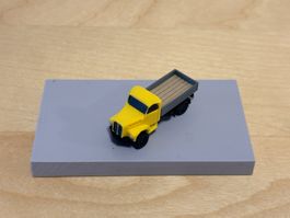 Saurer 2DM zivil gelb mit offener Brücke 1:160 3D-Druck