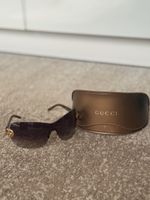 Gucci Sonnenbrille mit Herz-Detail - Sommer-Must-have!