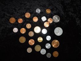 Glücksmünzen aus 28 verschiedenen Länder
