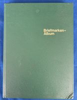 BRIEFMARKENALBUM MIT INTERNATIONALEN BRIEFMARKEN UNGESTEMP.