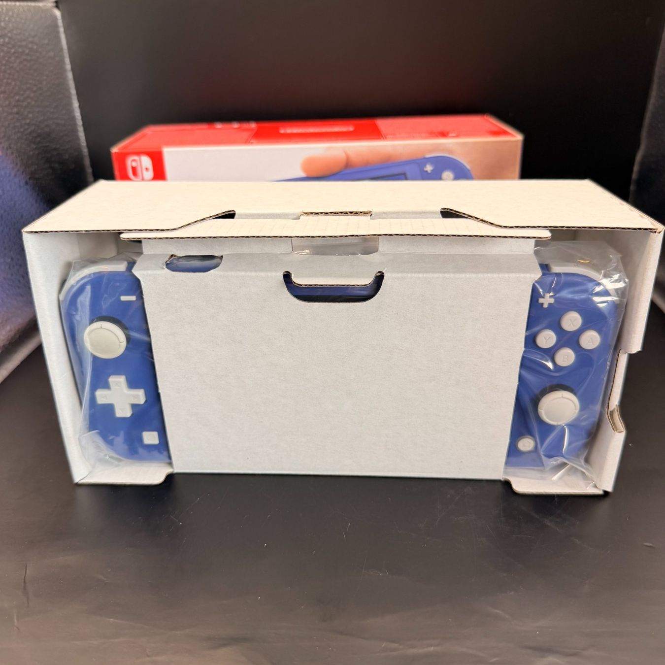 Nintendo Konsolen: Nintendo Switch Lite Blau – Gebraucht aus Düdingen von Nerdworld 3