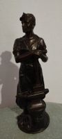 Sculpture ancienne  forgeron .