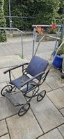 Antiker Kinderwagen aus Metall