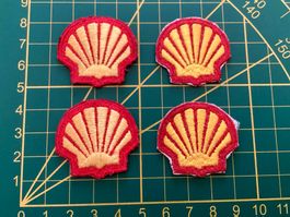 Shell. Vier kleine Wappen aus Stoff.