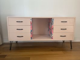 Pink Dresser with patterned sides and hairpin legs