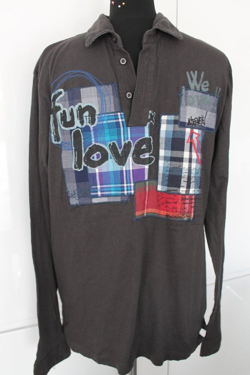 PULL DESIGUAL FOND NOIR MOTIFS LUMINEUX MULTICOLORES Taille L 40 TBE