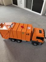 Bruder Spielzeug Müllwagen orange MAN TGS bespielt Zustand
