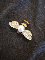 Broche style Gucci en métal doré 
