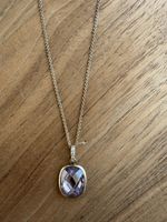 Silver necklace with purple stone pendant