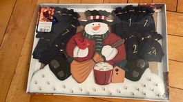 Adventkalender mit 24 Filzbeutelchen