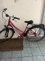 Red Ladies Bicycle ready for ride