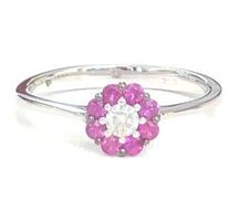 Cocktailring: 8 Rubine 0.26ct. und 1 Diamant 0.10ct., 1190.-