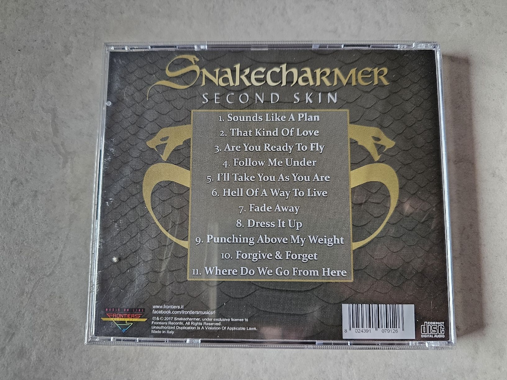 CDs: Snakecharmer  -  Second Skin  /  Fabrikneu – Neu und originalverpackt aus Schneisingen von backstore24 1