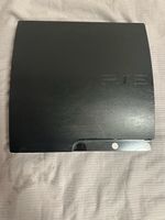 Spielkonsole Sony PS3 mit zwei Controllern und Ladestation