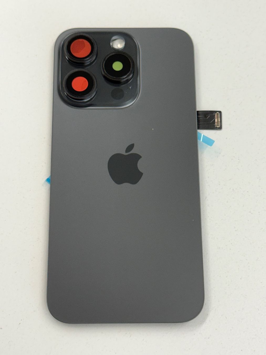 Apple Telefoni cellulari / Smartphones: Vitre Arrière pour iPhone 15 Pro avec NFC | Flash – Nuovo e nell'imballaggio originale da Zug venduto da ElPhone