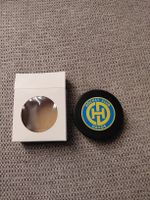 HC Davos Puck mit Verpackung von Burger King 