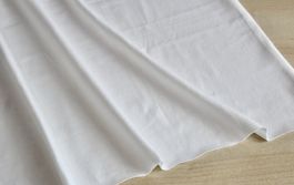 ***AUSVERKAUF*** Stoff Baumwolljersey uni cremeweiss