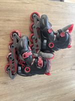 Patins à roulettes Oxelo noir rouge taille 30-32 enfant