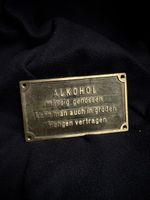 Metallschild mit Spruch Alkohol gebraucht