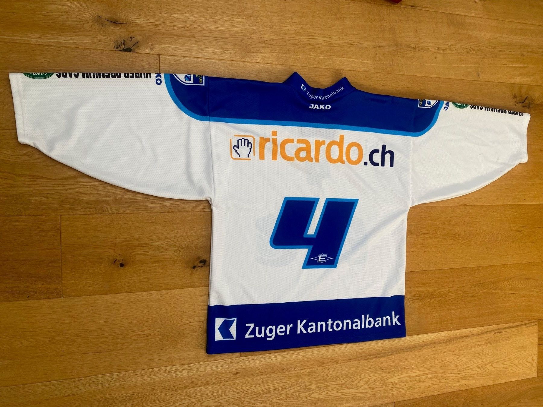 Canottiere & Pantaloni: EVZ Hockeyshirt Grösse S – Usato da küssnacht am rigi venduto da Daot