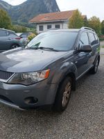 Mitsubishi Outlander SUV grau gebraucht mit Hagelschaden