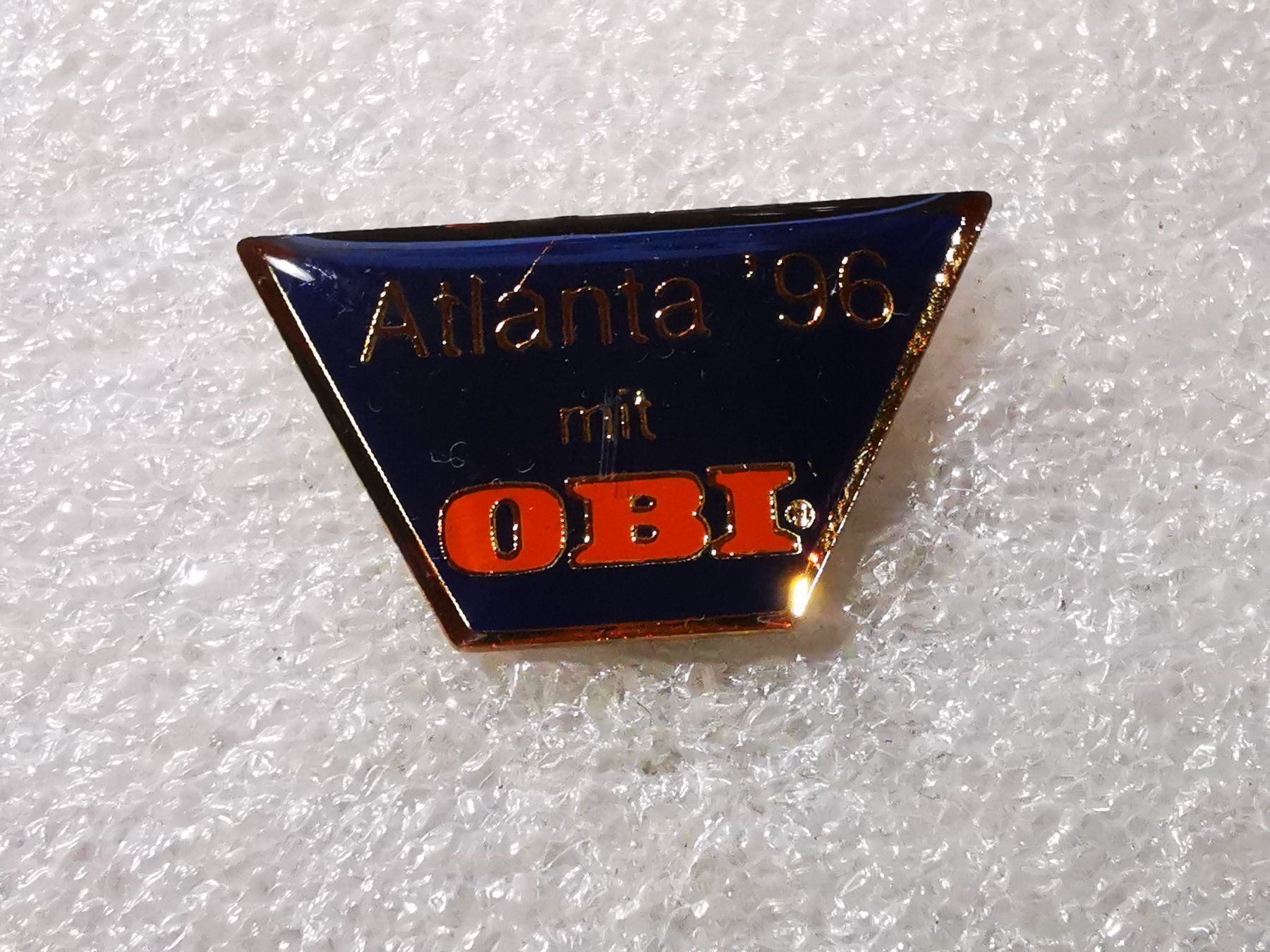 Placchette & Badge: Ansteckpin 131: Olympia mit OBI – Usato da Oppligen venduto da Pin-Fall-Shop