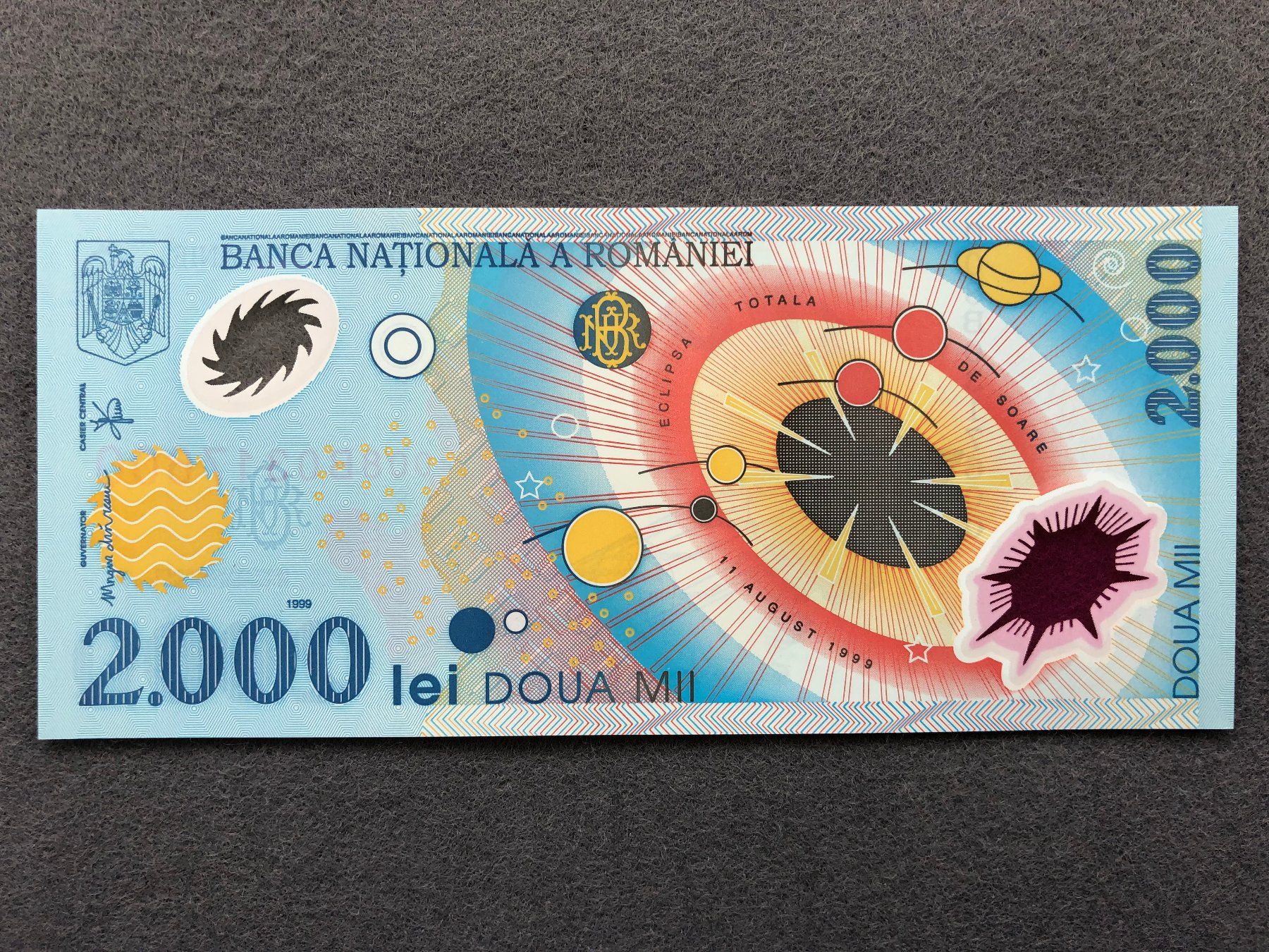 Banconote: Romania 1999 - Rumänien - 2000 Lei UNC – Nuovo e nell'imballaggio originale da Pfäffikon SZ venduto da Sieben77 1