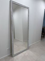 Mirror with wooden handcrafted frame