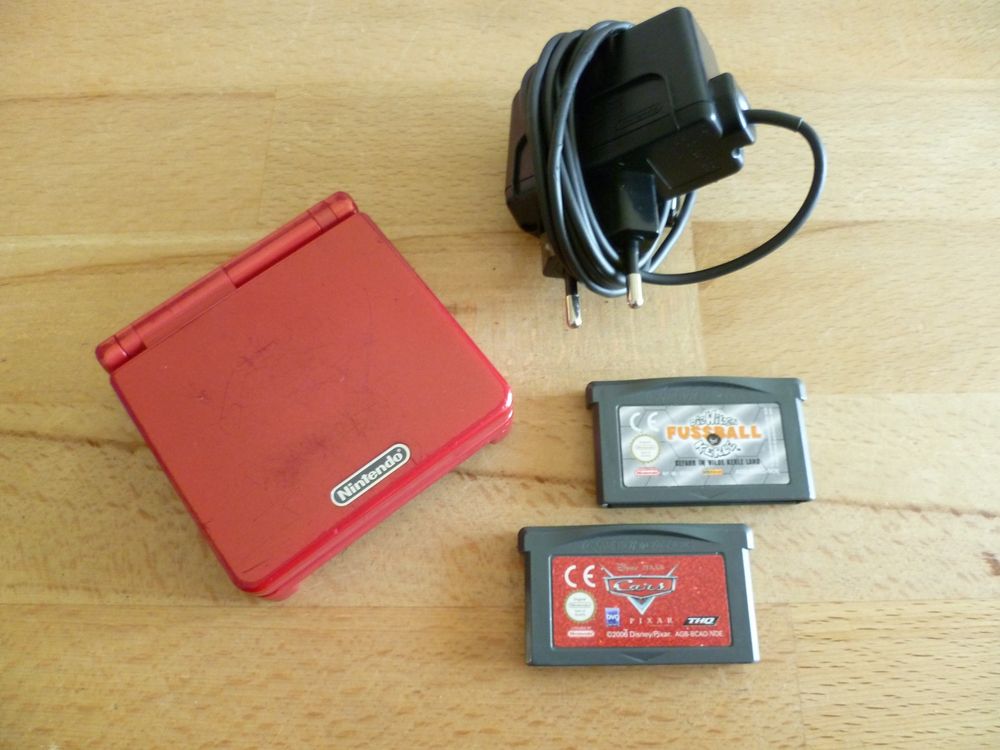 Nintendo Game Boy Advance SP rot + Ladegerät und 2 Spiele Kaufen auf Ricardo