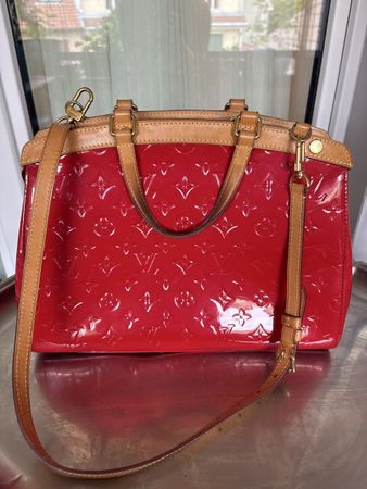 Louis Vuitton red handbag vintage. Great condition!