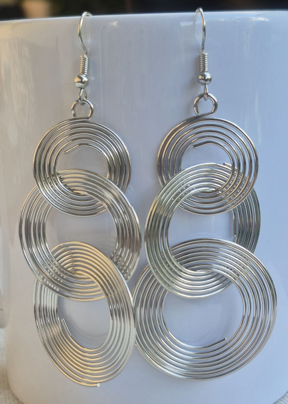 Boucles d'oreille: Orecchini pendenti cerchi a spirale colore argento – Neuf (Voir description) à Giubiasco par Stefaniav 1