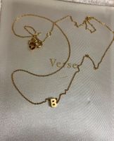A letter necklace, yellow gold 18 carat