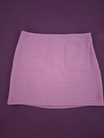 Zauberhafter rosa Bouclé-Rock