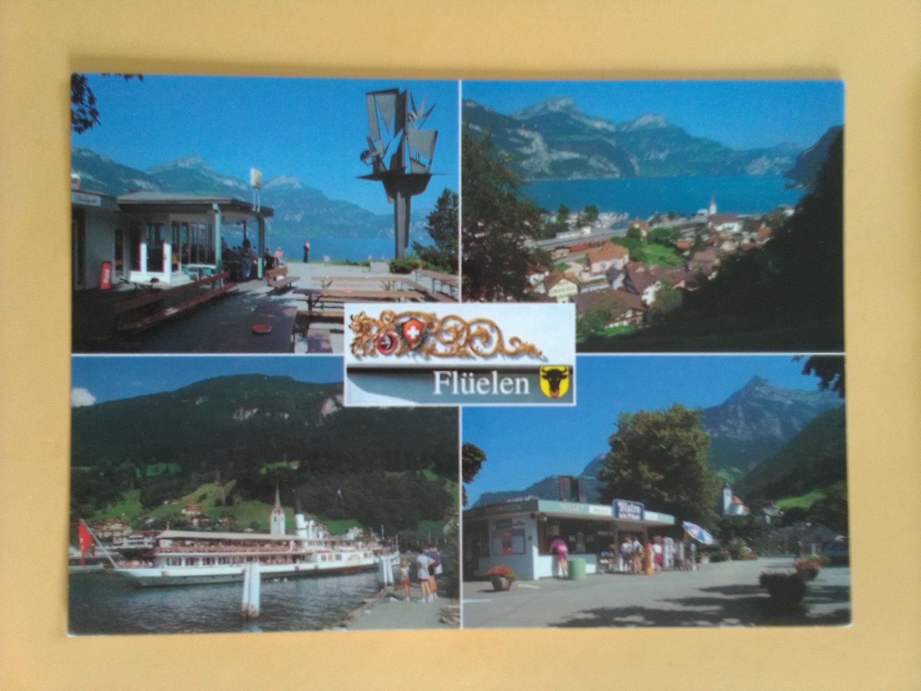 Cartoline postali: Flüelen Uri mehrbildrig mit Bistro Schiff – Usato da Küttigen venduto da Melisch1000