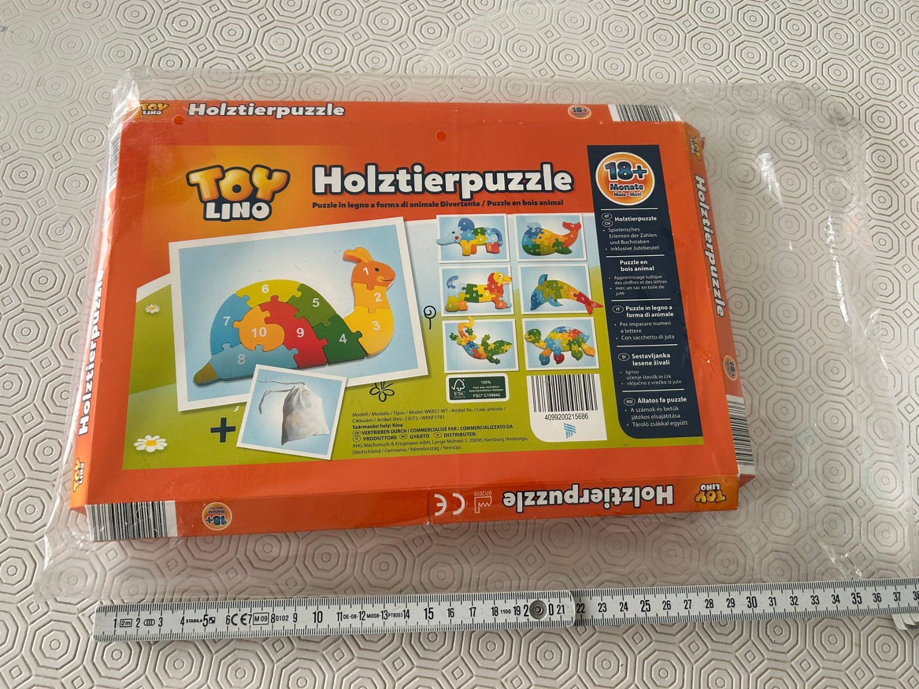 Puzzle: Puzzle legno 10 pezzi lumaca colorata – Usato da Melano venduto da H-Sara 2