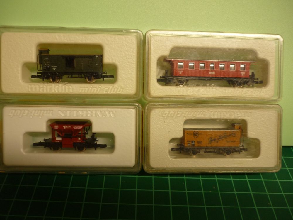 1) MICRO-TRAINS LOT DE 4 WAGONS DIVERS TYPE AMERICAIN DIVERS