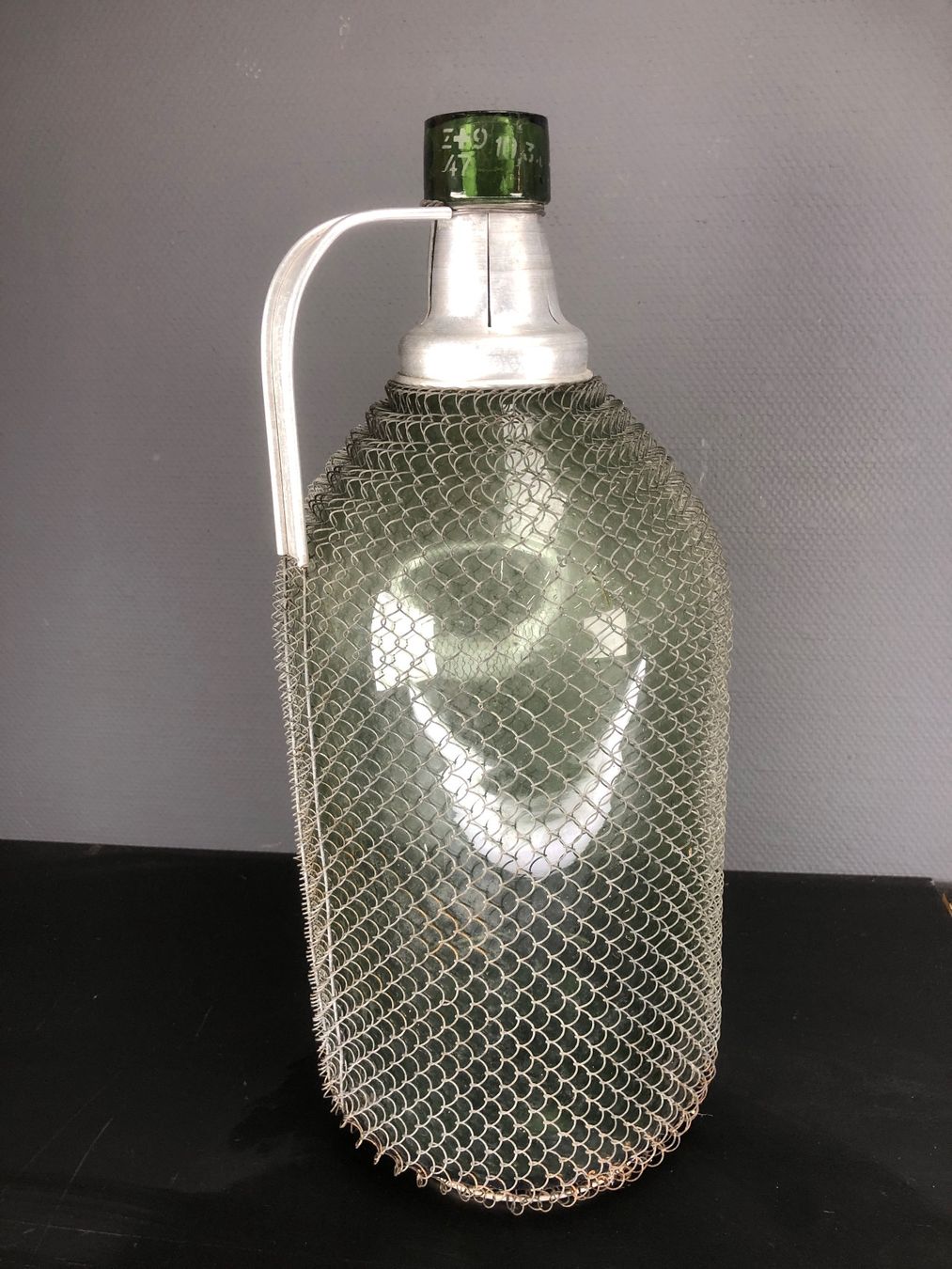 Accessori: Grosse Weinflasche, Weinballon, Mostflasche mit Gitternetz – Usato da Laufenburg venduto da industrial-silence
