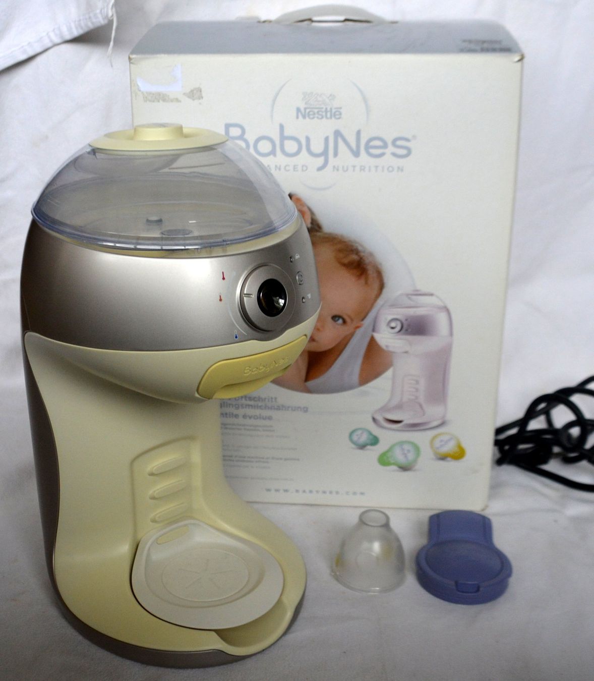 Nestlé Cibi & Specialità: BabyNes Nestle Milchmaschine / machine à lait bebe – Usato da Collonges venduto da arashee 1