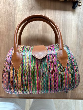 Handbag multicolored woven material