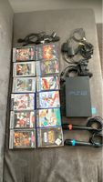 Playstation 2 Konsole mit 14 Spielen, Singstar + Mikrofone