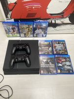 PlayStation 4 Konsole mit zwei Controllern und 7 Spielen