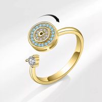 Woman ring gold with blue zirconia