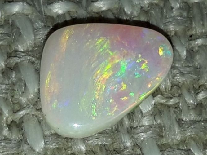 Pietre preziose: Australischer Flashfire Opal 0.47ct – Nuovo e nell'imballaggio originale da Uerkheim venduto da Winwinner 5