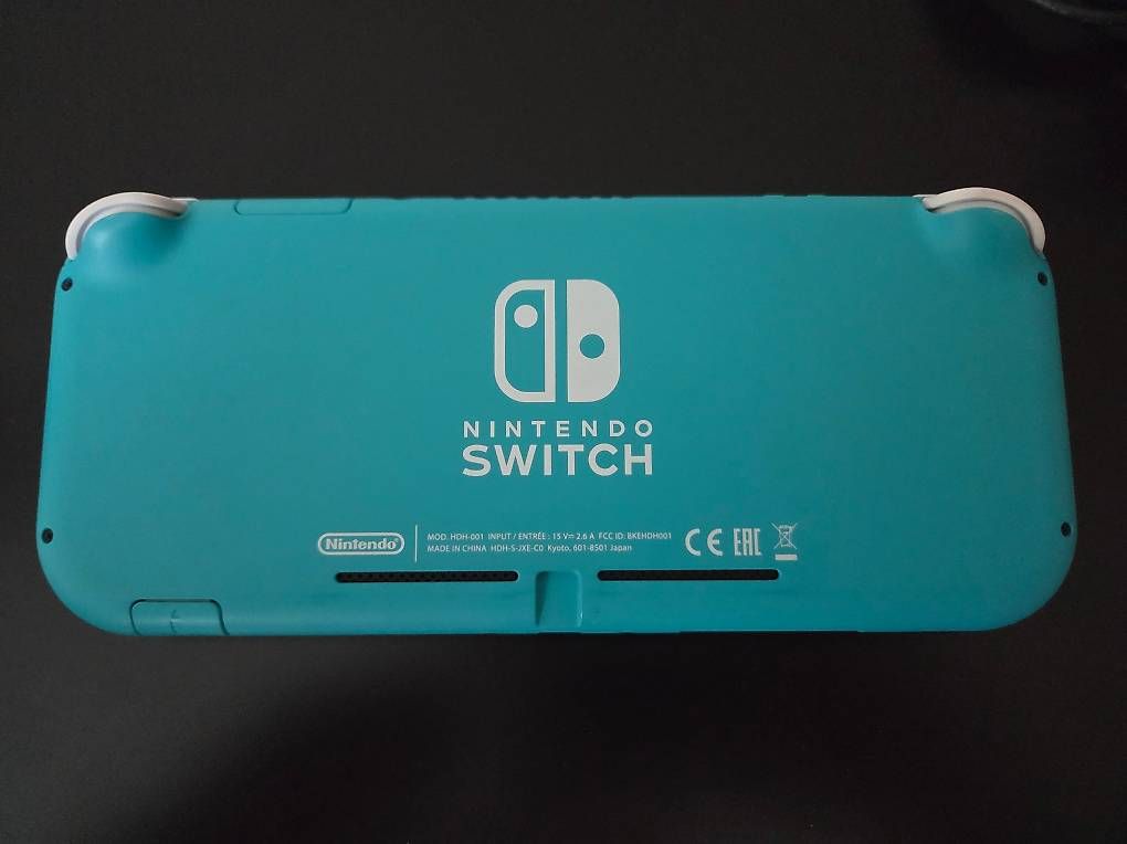 Nintendo Consoles: Nintendo Switch Lite - Türkis mit Reisecover – D'occasion à Vilters par oOLinkOo 3