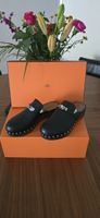 Hermès Clogs / Mules in Schwarz, Grösse 40 – neuwertig