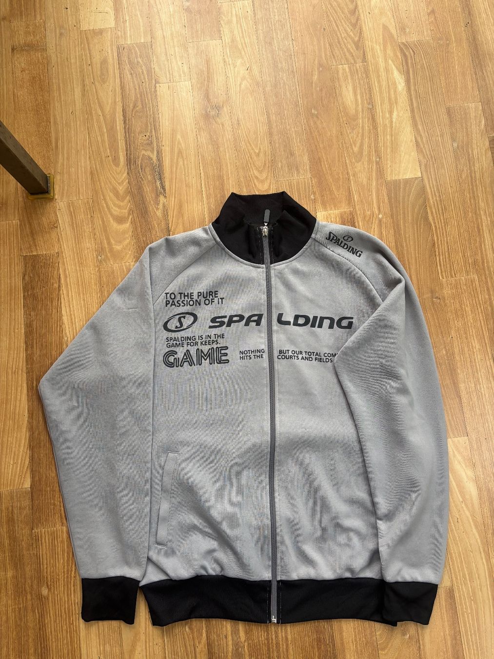 Giacche: Spalding Trainingsjacke Grau/Schwarz, L – Usato da Zürich venduto da bpf1700