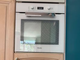Four encastrable Miele H 6460-60 BP – Excellent état