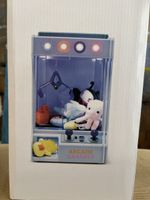 Arcade Grabber Toy with Lights and Music - Fun for All!