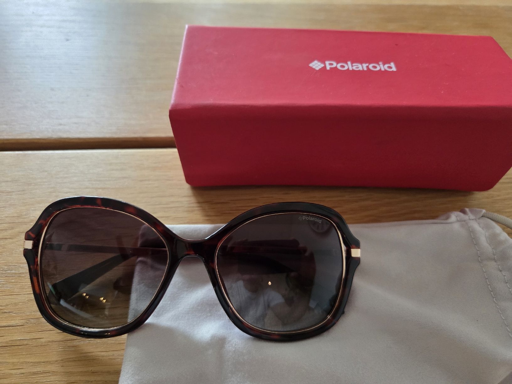 Polaroid Brillen & Gläser: Polaroid sunglasses women – Gebraucht aus Zug von Bibibo